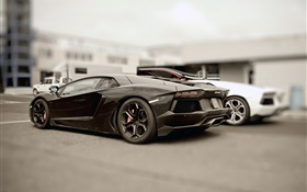 Lamborghini Aventador supercar preto no estacionamento